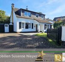 Charmantes, freistehendes Einfamilienhaus mit Wintergarten und Atelier in Solingen Aufderhöhe