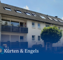 Modernisierte 2-Zimmer-Wohnung mit weitläufigem Wohnbereich, offener Küche und edlem Badezimmer - Siegburg
