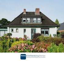 Charmantes Einfamilienhaus auf attraktiven Hanggrundstück mit Carport - Ritterhude