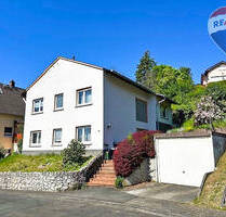 Einfamilienhaus mit Garten und Garage in Brechen