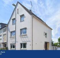Mehrfamilienhaus mit Gewerbeanbau, Doppelgarage und Garten - Hilden