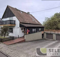 Freistehendes Ein- Zweifamilienhaus mit Doppelgarage in ruhiger Lage - Heusweiler / Holz