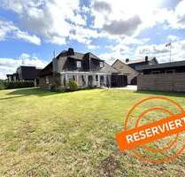 * RESERVIERT * Wohlfühlen in zentraler Lage - Ein-Zweifamilienhaus mit Wintergarten - Lohne