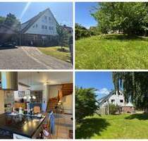 Großzügige Immobilie mit 294,3?m² Wohnfläche & traumhaftem Grundstück - ideal für 4 Parteien - Giekau