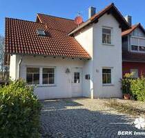 BERK Immobilien - Wohnidylle mit Ausblick: Doppelhaushälfte mit Charme und Entwicklungschance - Mömbris / Daxberg