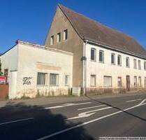 Sanierungsbedürftiges Mehrfamilienhaus mit Gewerbepotenzial in Könnern