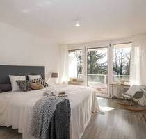 2-Zimmer-Wohnung mit großer Süd-Loggia und exklusiver Wellness Oase in ruhiger Lage - Unterschleißheim / Lohhof