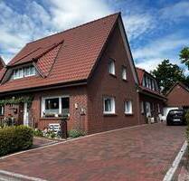 Zweifamilienhaus im Saterland mit großzügigem Grundstück und gepflegtem Garten