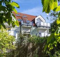 AIGNER - Lichterfülltes Dachgeschoss: Wohnen auf zwei Etagen mit Südterrasse - am Agricola-Park - München
