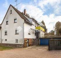 Einfamilienhaus in ruhiger Lage mit Garten, Terrasse und Stellplätzen - Krombach