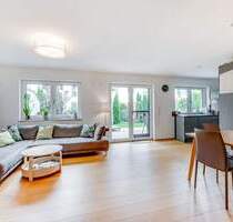 AIGNER - Moderne Gartenwohnung auf zwei Etagen mit Südterrasse und eigenem Garten - Oberding