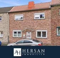 Modernisiertes Einfamilienhaus mit neu gestaltetem Garten und Doppelgarage in Übach-Palenberg!