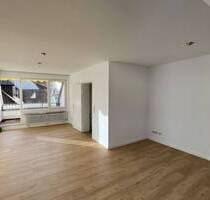 Pfiffige 3,5-Zimmer-DG-Wohnung mit Dachbalkon im Herzen von Bad Krozingen!