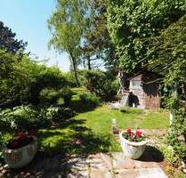 Doppelhaushälfte mit märchenhaftem Garten in idyllischer Lage von Eching