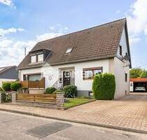 Wohnkomfort auf ganzer Linie: Zweifamilienhaus mit großem Garten, Vollkeller und Garage - Cramme