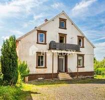 Mehrfamilienhaus mit vier Wohneinheiten, großem Garten und viel Potenzial - Gries