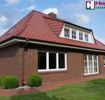 Direkt am Fehnkanal! Ein super gepflegtes Einfamilienhaus im Bungalowstil mit einer sehr großen Doppelgarage - Moormerland Jheringsfehn