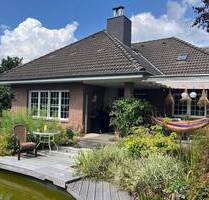 Charmantes Einfamilienhaus mit Keller, Einliegerwohnung, Teich und Doppelgarage - Ratekau