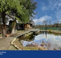 Idyllisches Einfamilienhaus am Stadtrand Oschersleben mit Wassergrundstück Naturbadeteich