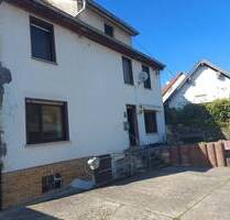 Top-Gelegenheit! Einfamilienhaus mit Nebengebäude und Garage in Schloßböckelheim zu verkaufen