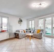AIGNER - Ihr Familienzuhause: 4-Zimmer-Wohnung mit großzügigem Raumkonzept und Südbalkon - Unterhaching