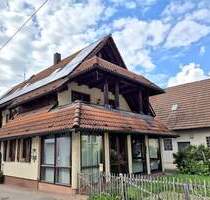 Historie trifft Gemütlichkeit: Zweifamilienhaus mit liebevollen Details und Garten in Esslingen-Mettingen