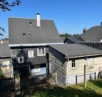 Wohnhaus mit Doppelgarage - 49.000,00 EUR Kaufpreis, ca.  120,00 m² Wohnfläche in Neuhaus am Rennweg (PLZ: 98724) Steinheid