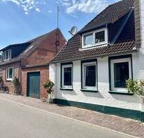 Zwei Häuser - ein Preis: Seltene Gelegenheit, vier vermietete Einheiten + eine freie Wohnung - Wöhrden