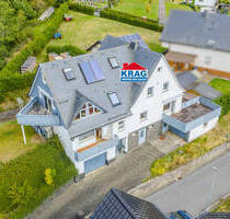 KRAG Immobilien ++ Vielseitiges Wohnhaus mit mehreren Etagen, Balkonen und Garagenanbau - Bad Endbach Hartenrod