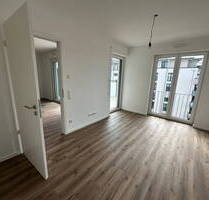 Erstbezug mit Fernblick - Ruhige, helle 2-Zimmer-Wohnung mit großem SW-Balkon und TG - Trostberg