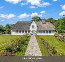 Stilvolles Einfamilienhaus mit Garage, eingebettet in ein traumhaftes Grundstück in Morsum