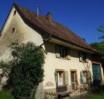 Baugrundstück mit aufstehendem Gebäude u. Scheune in zentraler Lage in Inzlingen
