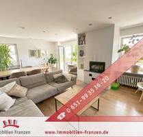 Trier-Ruwer: 121 m² große, moderne EG-Wohnung mit Balkon, Kamin, 2 Stellplätzen und Gartenmitbenutzung