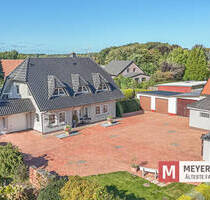 Familienfreundliches Einfamilienhaus mit separater Gewerbefläche in Jaderberg (Obj.-Nr. 6536)