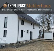 Neubau-Eigentumswohnung mit Grundstück als Garten - Ebershausen