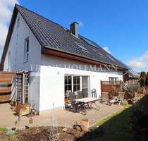Einfamilienhaus mit Einliegerwohnung in Henstedt-Ulzburg