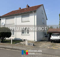 Zweifamilienhaus in Kirchlengern - ruhige Sackgassenlage, großer Garten & Garage!