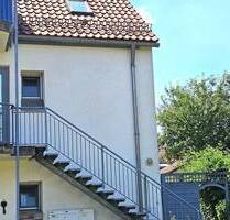 RESERVIERT! Charmante 2-Zimmer-Wohnung mit Gartenanteil, Balkon & Tiefgarage in ruhiger Lage von Dorfen - Ihr neues Zuhause wartet!