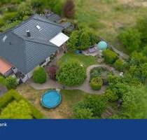 Eleganter Winkelbungalow mit Gartenidylle und Ausbaureserve - Elmenhorst