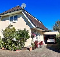 Eindrucksvolles Stadthaus mit Garage, pflegeleicht angelegtem Gartengrundstück mit überdachter Südwest- Terrasse in Bad Zwischenahn zentrumsnah