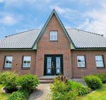 Friesenstil trifft Wohnkomfort - Großzügiges Einfamilienhaus mit Gartenidylle in Neuenkirchen