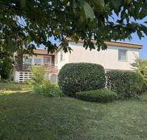 Einfamilienhaus in wunderschöner Lage und mit Gartengeschoss-Wohnung - March-Buchheim