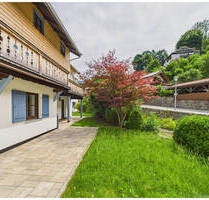 Zeitlos schön: Gartenwohnung am Alpbach in Tegernsee nach Kernsanierung
