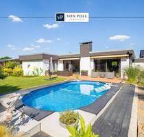 Modernisierter Bungalow mit Einliegerwohnung, Pool und Garten - Dormagen Hackenbroich