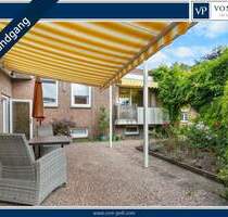 Flachdach-Einfamilienhaus (Split-Level) mit vermieteter Gewerbeeinheit in Schortens-Grafschaft - Schortens / Grafschaft