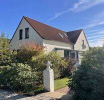 Teilvermietetes Zweifamilienhaus inkl. Baugrundstück in Schwanewede-Beckedorf zu verkaufen