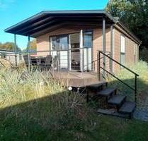 Komplett ausgestattetes Ferienhaus mit Sonnenterrasse auf Pachtgrund in Scharbeutz nahe Ostsee