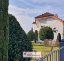 Gepflegtes Zweifamilienhaus mit Garten, Garage & großem Hobbyraum in Nußloch