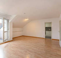 **Wohnen oder Investieren in Unterhaching: 2-Zimmer-Dachgeschosswohnung mit Potenzial!**