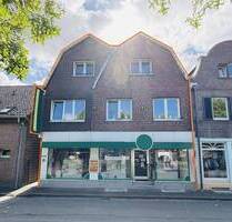 zentral gelegenes & teilsaniertes Wohn- und Geschäftshaus mit großer Wohneinheit in Neuenkirchen!